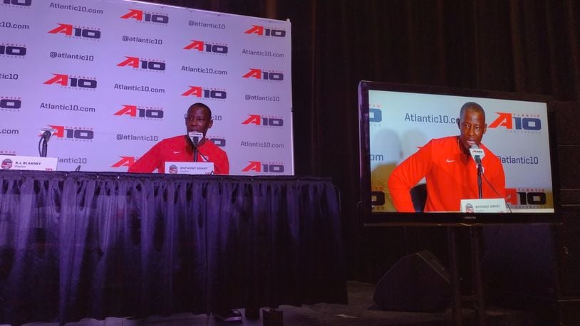 Dayton's Anthony Grant speaks at a postgame press conference following a victory against Massachusetts in the Atlantic 10 Conference quarterfinals on Friday, March 11, 2022, at Capital One Arena in Washington, D.C. David Jablonski/Staff