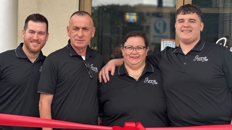 The Jusufi Family at the grand opening of their Jimmy’s Italian restaurant in the Oregon District in May 2024. They are (left to right) son Albert, a recent Wright State grad; parents Mo and Mira; son Doni, a Fairmont High junior who wrestles for the Firebirds. CONTRIBUTED