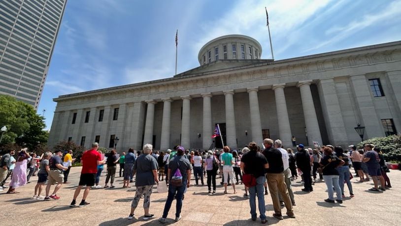 A group of over a hundred gathered outside the Statehouse Wednesday, June 21, 2023, to protest the Senate’s proposed operating budget, which the group contends does not supply adequate funding to a wide array of public services that Ohioans depend on.