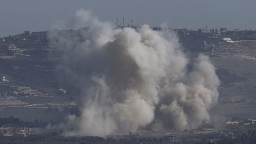 Smoke rises following an Israeli bombardment in southern Lebanon as seen from northern Israel, Friday, Oct. 4, 2024. (AP Photo/Baz Ratner)