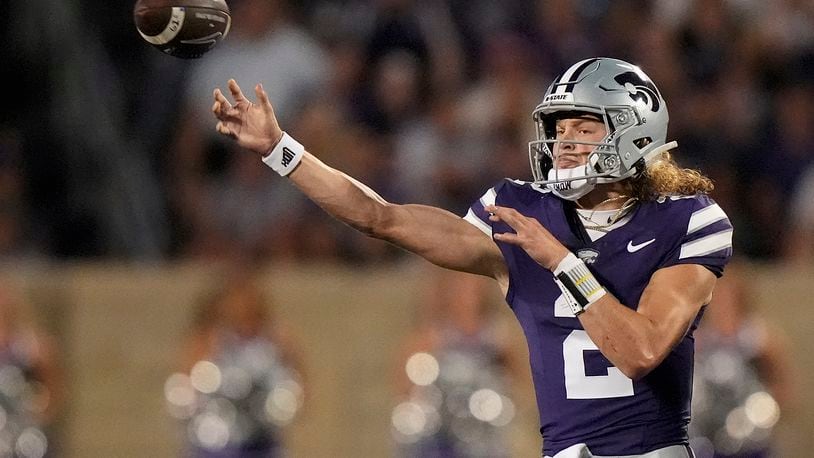 Kansas State quarterback Avery Johnson passes during the first half of an NCAA college football game against Arizona Friday, Sept. 13, 2024, in Manhattan, Kan. (AP Photo/Charlie Riedel)