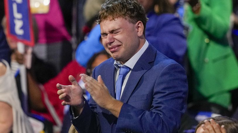 FILE - Gus Walz cries as Democratic vice presidential nominee Minnesota Gov. Tim Walz speaks during the Democratic National Convention Wednesday, Aug. 21, 2024, in Chicago. (AP Photo/Matt Rourke, FIle)