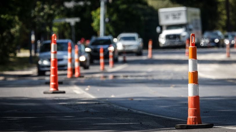 Drivers on Ohio 48 through Oakwood will deal with orange traffic cones as the Ohio Department of Transportation said the resurfacing project on Far Hills Avenue though the city may not be done until late September or early October. Jim Noelker/Staff