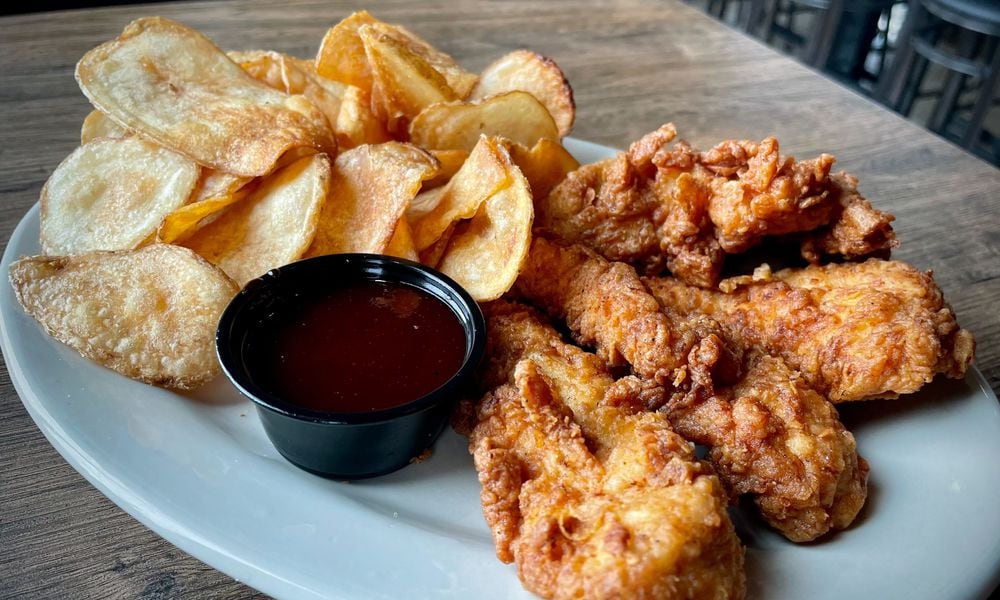 Butterbees American Grille, a family friendly, sports-themed restaurant and bar, is open in Xenia next door to Skyline Chili on Progress Drive. NATALIE JONES/STAFF