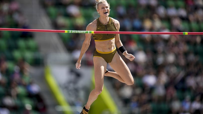 Katie Moon reacts after clearing the bar as she competes in the women's pole vault final during the U.S. Track and Field Olympic Team Trials, Sunday, June 30, 2024, in Eugene, Ore. (AP Photo/Charlie Neibergall)