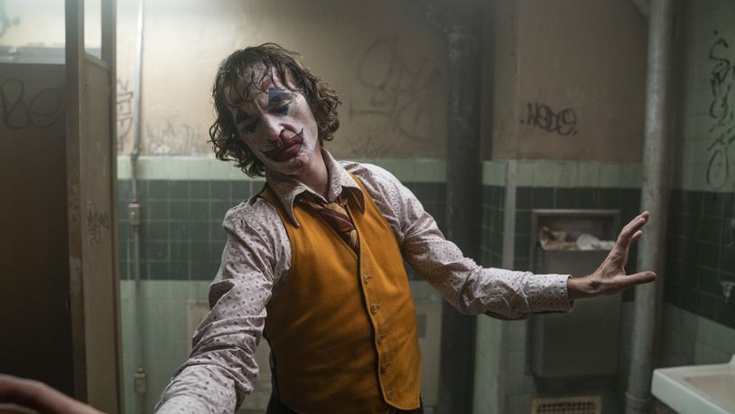 This image released by Warner Bros. Pictures shows Joaquin Phoenix in a scene from "Joker." (Niko Tavernise/Warner Bros. Pictures via AP)