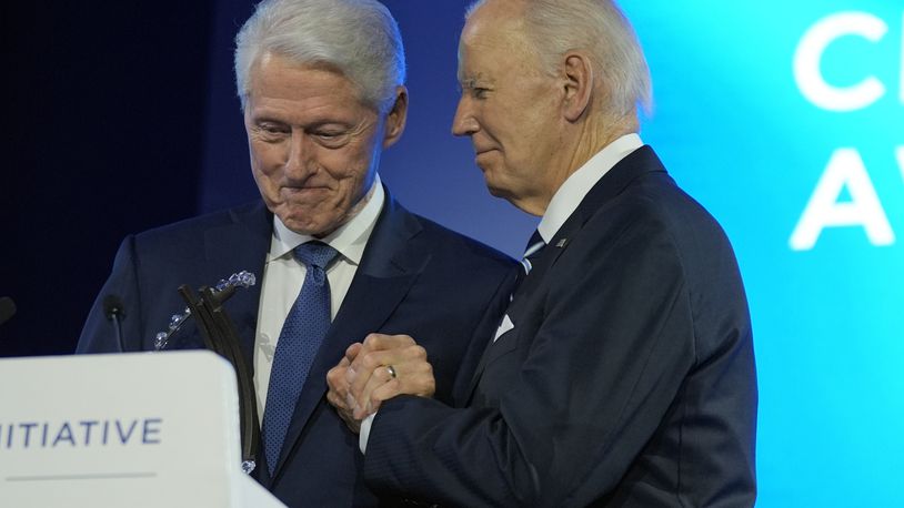 President Joe Biden is presented with the Global Citizen Award by former President Bill Clinton at the Clinton Global Initiative Monday, Sept. 23, 2024, in New York. (AP Photo/Manuel Balce Ceneta)