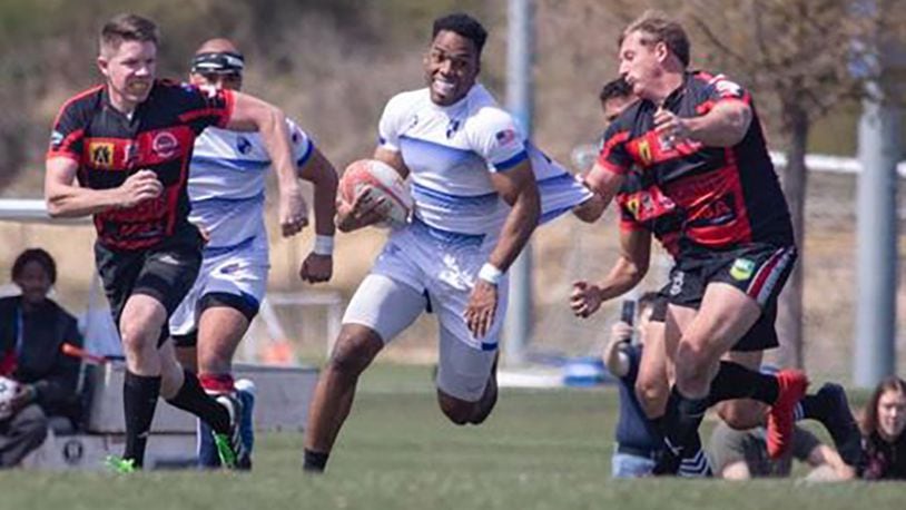 Air Force 1st Lt. Marquez Davis carries the ball during the Rugby Town 7 International Tournament on Aug. 26, 2017. COURTESY PHOTO/1ST LT. MARQUEZ DAVIS