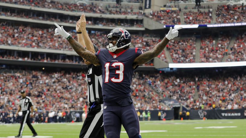 Wide receiver Braxton Miller of the Houston Texans is tackled by