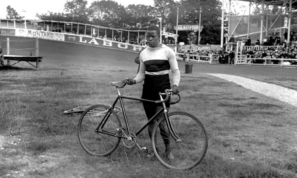 Major Taylor was a cyclist who began his professional career in 1896 at the age of 18. By the time this photo was taken in 1907 at the Vlodrome Buffalo race track in Paris, Taylor had a distinguished career and was staging a comeback. (National Library of France)