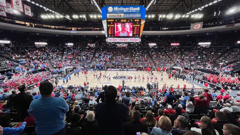 Dayton and Cincinnati are introduced before the game on Saturday, Dec. 16, 2023, at the Heritage Bank Center in Cincinnati. David Jablonski/Staff