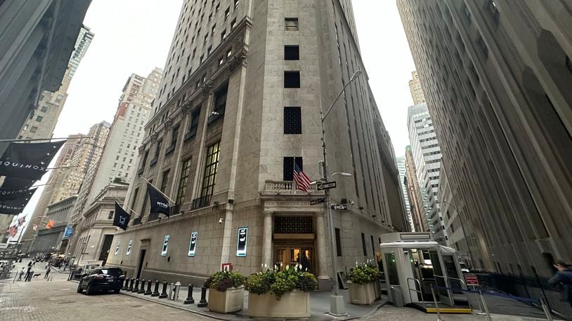 FILE - The entrance to the New York Stock Exchange at Wall and New Streets is shown on Oct. 2, 2024, in New York. (AP Photo/Peter Morgan, File)