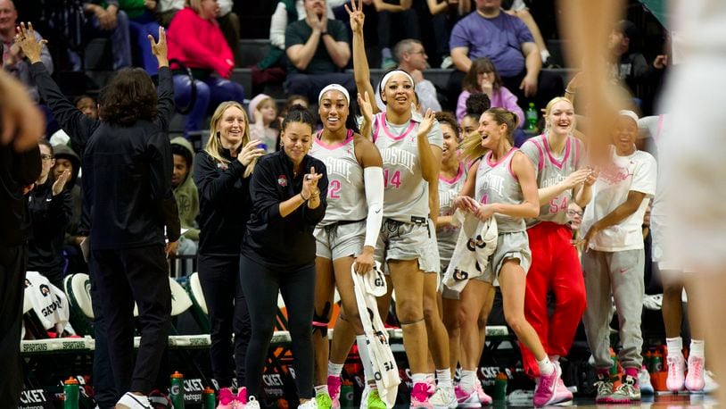 Cotie McMahon and Ohio State Buckeyes celebrate a win at Michigan State. (Photo courtesy Ohio State Athletics)