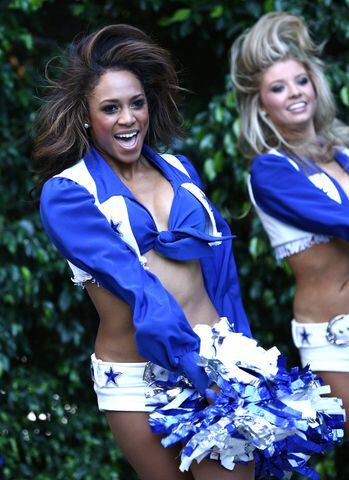 The Dallas Cowboys Cheerleaders perform during the game between the News  Photo - Getty Images