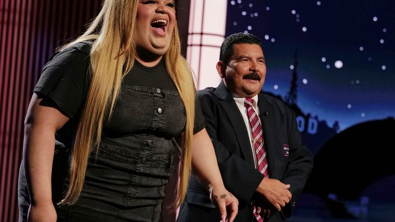 FILE - This image released by Disney shows TikTok creator Jools Lebron, left, with talk show personality Guillermo Rodriguez on the set of "Jimmy Kimmel Live!," Aug. 19, 2024, in Los Angeles. (Randy Holmes/ABC-Disney via AP, File)