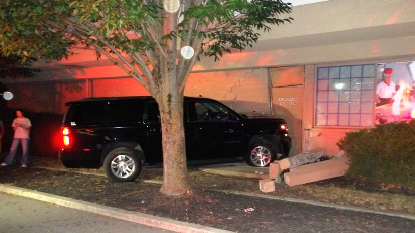 A 2018 Chevy Suburban crashed into Sake Japanese Steak House and Sushi Bar in Miami Twp. around 9:40 p.m. Saturday, Sept. 21, 2024. The vehicle's driver lost control of the vehicle, which was heading west on Miamisburg Centerville Road. CONTRIBUTED