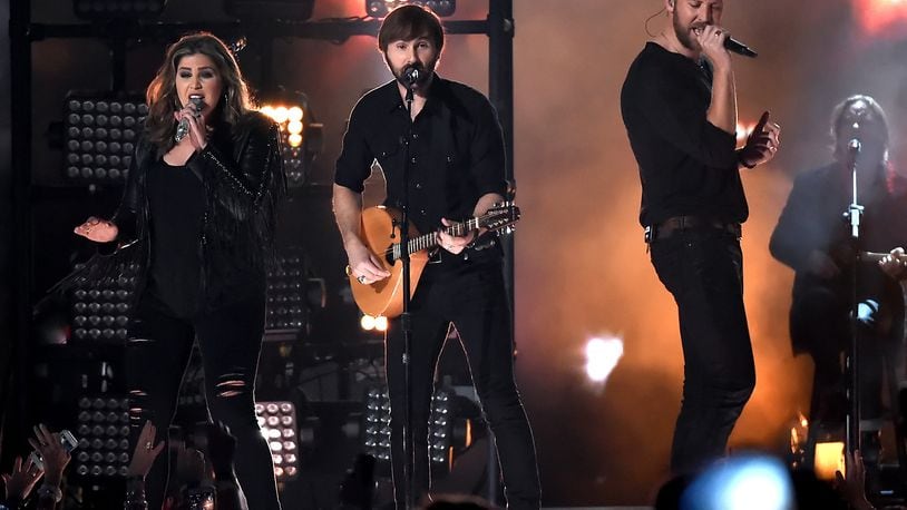 ARLINGTON, TX - APRIL 19: (L-R) Musicians Hillary Scott, Dave Haywood and Charles Kelley of Lady Antebellum perform onstage during the 50th Academy Of Country Music Awards at AT&T Stadium on April 19, 2015 in Arlington, Texas. (Photo by Ethan Miller/Getty Images for dcp)