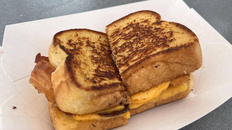 Just over a dozen food trucks on Saturday, Aug. 3, 2024 put their spin on what it means to have bacon at the forefront during Bacon Fest at the Fraze Pavilion in Kettering. NATALIE JONES/STAFF