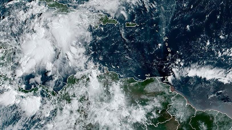 This image provided by the National Oceanic and Atmospheric Administration shows a cluster of storms located south of the Cayman Islands which are expected to strengthen in upcoming days, Monday, Sept. 23, 2024. (NOAA via AP)