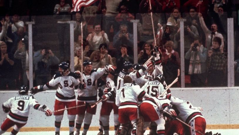 FILE - In this Feb. 22, 1980, file photo, the U.S. hockey team celebrates with goalie Jim Craig after a 4-3 victory against the Soviet Union in a medal round match at the the 1980 Winter Olympics in Lake Placid, N.Y. (AP Photo/File)