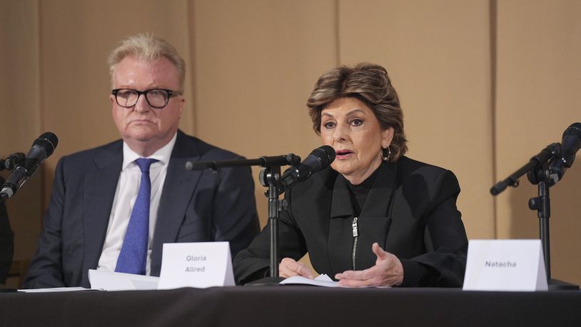 Members of the legal team, Dean Armstrong KC and American attorney Gloria Allred, who featured in 'Al-Fayed: Predator at Harrods' hold a press conference to discuss their involvement in the investigation and the legal claim against Harrods for failing to provide a safe system of work for their employees, at Kent House in Knightsbridge, London, Friday Sept. 20, 2024. Multiple ex-Harrods employees have accused Mohamed Al Fayed, the Egyptian billionaire who owned the luxury department store for more than 25 years, of rape and sexual assault. (Yui Mok/PA via AP)