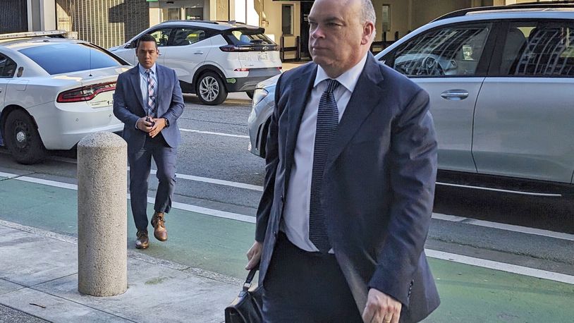 FILE - British tech magnate Mike Lynch walks into federal court in San Francisco, March 26, 2024, (AP Photo/Michael Liedtke, File)