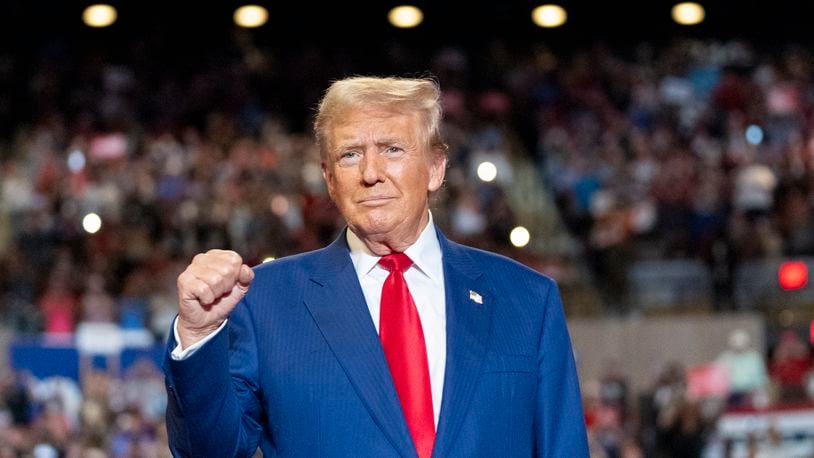 Republican presidential nominee former President Donald Trump pumps his fist as he arrives to speak at a campaign event at Nassau Coliseum, Wednesday, Sept.18, 2024, in Uniondale, N.Y. (AP Photo/Alex Brandon)