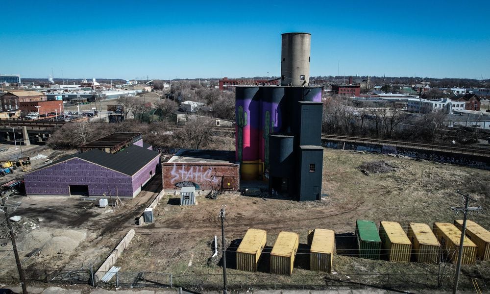 Wes Hartshorn and his two friends/business partners, Shannon Thomas and Scott Johnson, are in the midst of redeveloping 1.5 acres near 2nd Street Market in downtown Dayton into The Silos, a food hall and beer garden with 13,000-square-feet of outdoor space. JIM NOELKER/STAFF