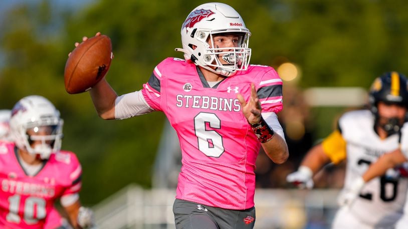 Cutline: Stebbins High School sophomore Devin McCormick throws the ball during their game against Shawnee on Friday night at Edmundson Stadium in Riverside. The Indians overcame a 15-point deficit in the fourth quarter to beat Shawnee 35-34. Michael Cooper/CONTRIBUTED