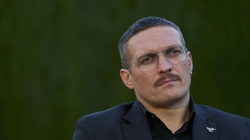 FILE - Ukrainian heavyweight boxing champion Oleksandr Usyk, poses for a photo, during an interview with The Associated Press in Valencia, Spain, Thursday, Nov. 9, 2023. (AP Photo/Jose Breton, File)