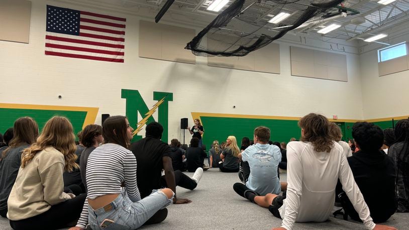 Students listen to district student assistance coordinator Sheree Coffman during Unity Day. Eileen McClory/ staff