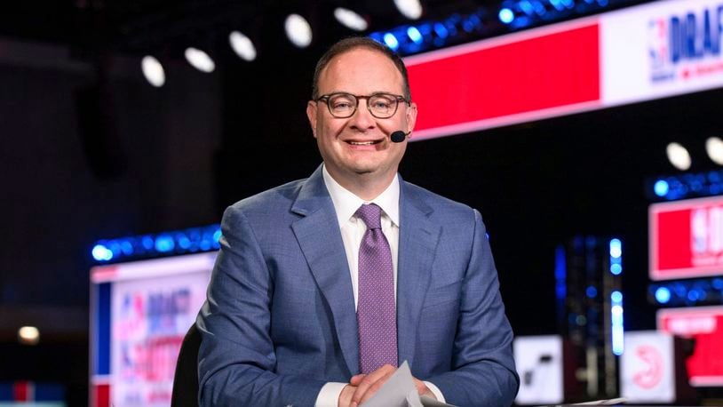 This undated image provided by ESPN shows ESPN NBA insider's Adrian Wojnarowski. (Allen Kee/ESPN via AP)