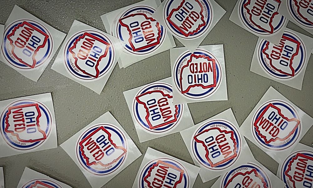 Long lines greeted voters at the Montgomery County Board of Elections on Tuesday, Oct. 6, 2020, as early voting began for the November general election. Early in-person voting in the state lasts until Nov. 2 and absentee ballots can be dropped off at the board office until Election Day, which is Nov. 3. In Montgomery County, registered voters can cast their ballot at the board of elections located at 451 W. Third St. in Dayton. MARSHALL GORBY/STAFF