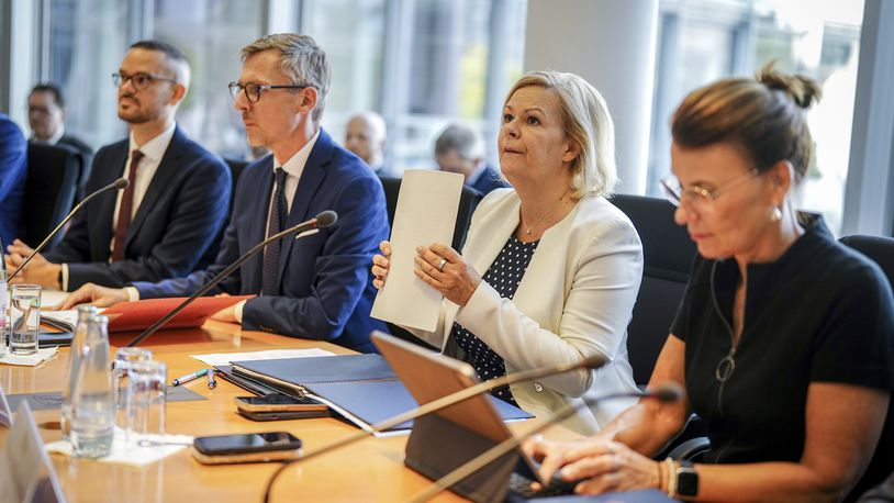 Federal Minister of the Interior and Home Affairs Nancy Faeser, second from right, attends the special session of the Bundestag's Committee on Internal Affairs, in Berlin, Friday, Aug. 30, 2024. Germany deported Afghan nationals to their homeland on Friday for the first time since August 2021, when the Taliban returned to power. (Kay Nietfeld/dpa via AP)