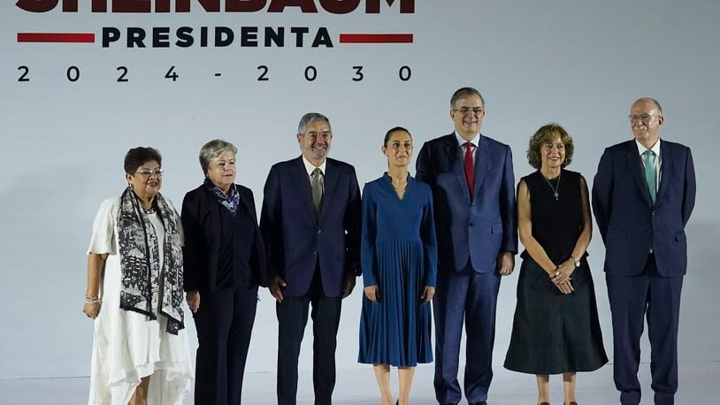 Incoming President Claudia Sheinbaum poses for a group photo with members of her newly-named Cabinet, in Mexico City, Thursday, June 20, 2024. (AP Photo/Marco Ugarte)