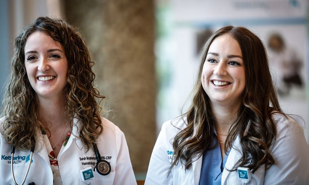 Nurse practitioner Sarah McPherson, left, and physician assistant Micayah Mills both work for Kettering Health. A growing number of patients are being seen by non-physicians, or advanced practice practitioners (AAP). JIM NOELKER/STAFF