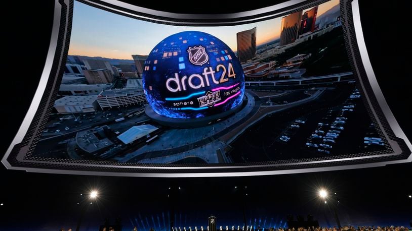 An image of the Sphere is displayed during the first round of the NHL hockey draft Friday, June 28, 2024, in Las Vegas. (AP Photo/Steve Marcus)