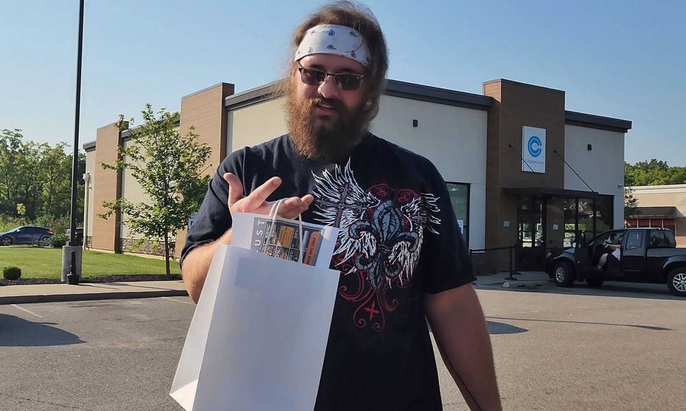 Joseph Ashby purchased recreational marijuana at Columbia Care in Monroe on the first day sales were available on Tuesday, Aug. 6, 2024. NICK GRAHAM / STAFF