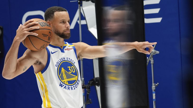 Golden State Warriors' Stephen Curry poses for a photo during the NBA basketball team's media day Monday, Sept. 30, 2024, in San Francisco. (AP Photo/Godofredo A. Vásquez)