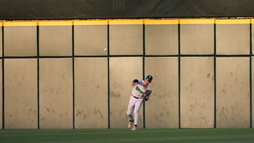 Dayton center fielder Ethan O'Donnell throws the baseball back to the infield during Wednesday's 5-3 win over West Michigan at Day Air Ballpark. Cassie Pietruszka/CONTRIBUTED