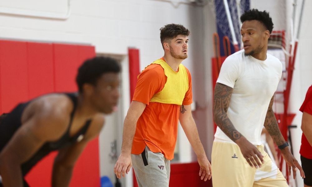 Former Wright State forward Grant Basile, center, practices with the Red Scare for The Basketball Tournament on Tuesday, July 16, 2024, at the Cronin Center in Dayton. David Jablonski/Staff