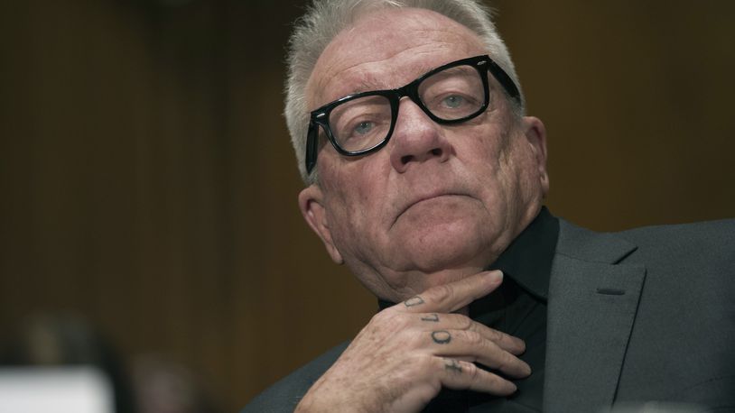 FILE - Former Backpage.com owner Michael Lacey attends a Senate committee on Jan. 10, 2017, on Capitol Hill in Washington. (AP Photo/Cliff Owen, File)