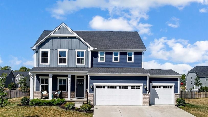 Listed for $607,000 by Coldwell Banker Heritage, the two-story frame home at 3801 Oak Creek Drive in Sugarcreek Twp. has about 3,960 square feet of living space including a finished basement and five bedrooms. CONTRIBUTED