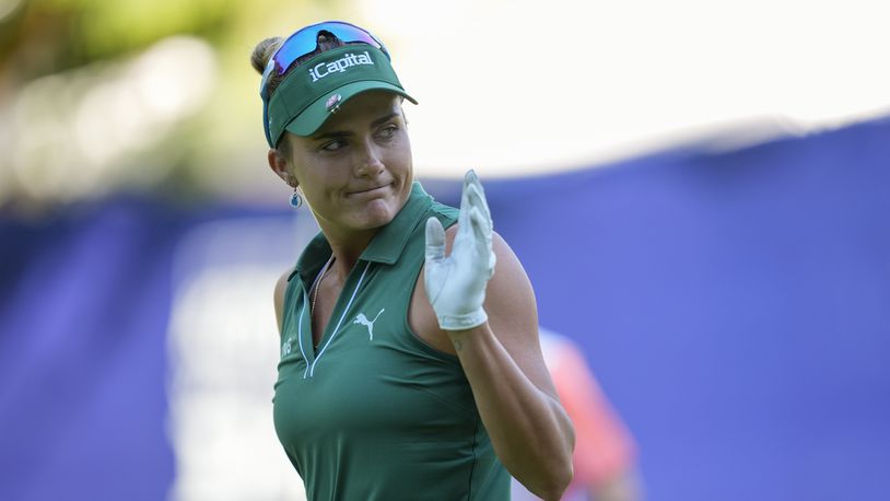 Lexi Thompson reacts after making birdie on the 12th hole during the first round of the Women's PGA Championship golf tournament at Sahalee Country Club, Thursday, June 20, 2024, in Sammamish, Wash. (AP Photo/Gerald Herbert)