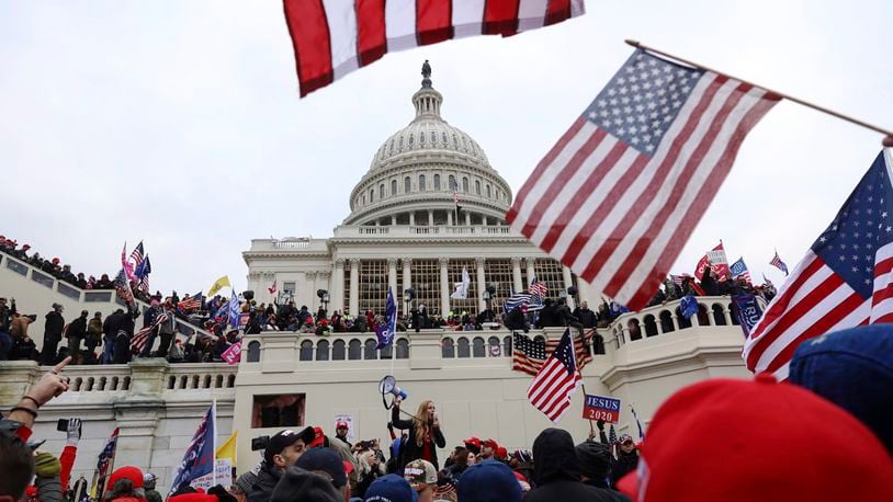 FILE - In this Wednesday, Jan. 6, 2021 file photo, supporters of President Donald Trump gather outside the U.S. Capitol in Washington. (AP Photo/Shafkat Anowar)