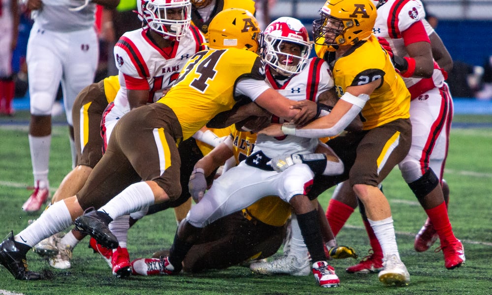 Alter and Trotwood-Madison, shown during last season's game in Xenia, figure to be two of the top teams in the area this season. Jeff Gilbert/CONTRIBUTED