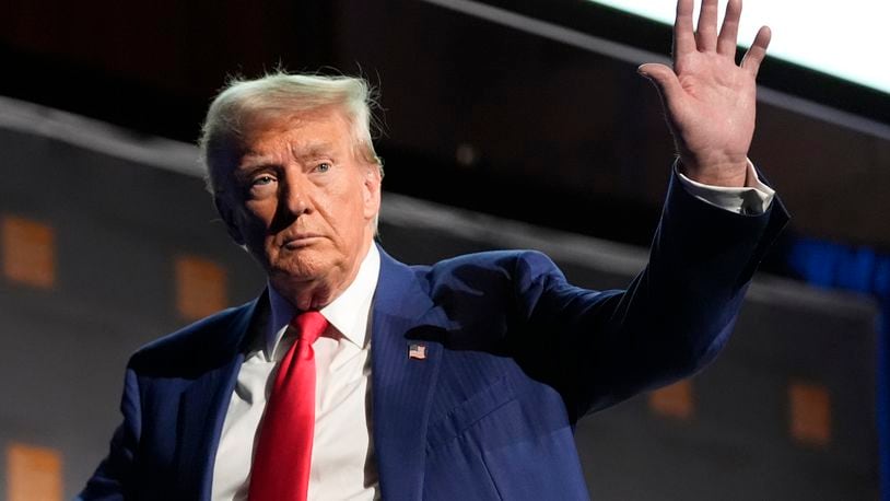 Republican presidential nominee former President Donald Trump waves as he departs a campaign event at the Economic Club of New York, Thursday, Sept. 5, 2024, in New York. (AP Photo/Alex Brandon)