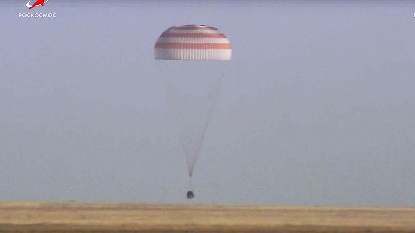 In this photo taken from video released by Roscosmos space corporation, Russian Soyuz MS-25 space capsule carrying the NASA astronaut Tracy Dyson and the Roscosmos cosmonauts Oleg Kononenko and Nikolai Chub lands south-east of the Kazakh town of Zhezkazgan, Kazakhstan, Monday, Sept. 23, 2024. (Roscosmos space corporation via AP)