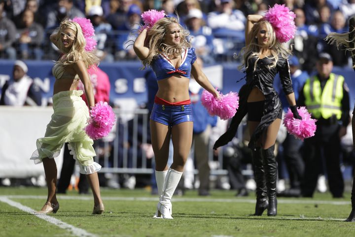 New England Patriots cheerleaders dressed in Halloween costumes