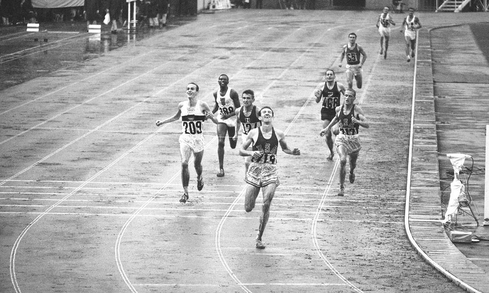 FILE - Bob Schul of West Milton, Ohio, hits the tape to win the 5,000 meter run at the Olympic Games in Tokyo Oct. 18, 1964. Schul, the only American distance runner to win the 5,000 meters at the Olympics, has died. He was 86. His death on Sunday, June 16, 2024, was announced by Miami University in Ohio, where Schul shined on the track and was inducted into the schools hall of fame in 1973. (AP Photo)